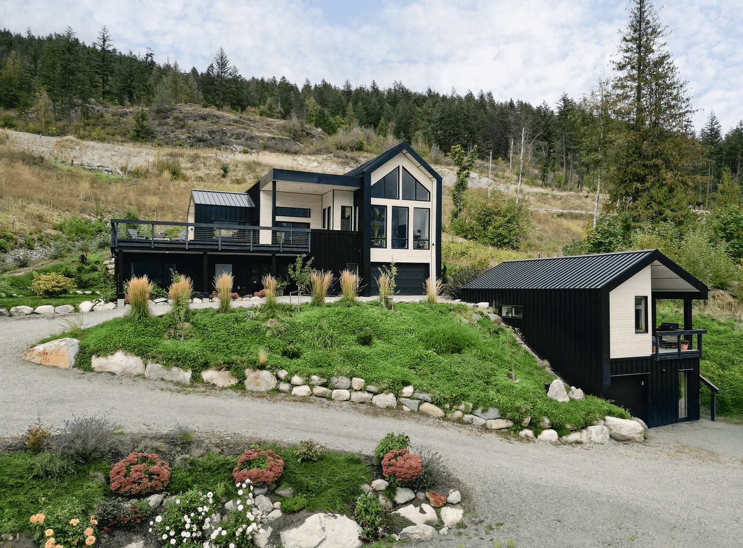 Newlines Contracting homes and landscaping on a hillside